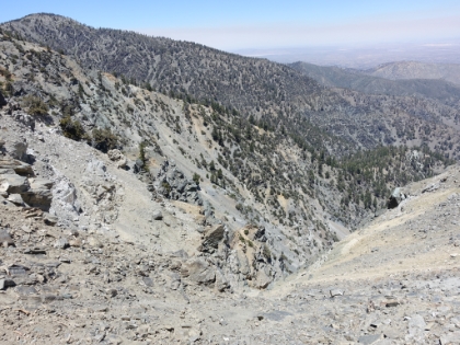 I look down the chute from the ledge. Highly doubt you could recover here in dry conditions let alone icy conditions.