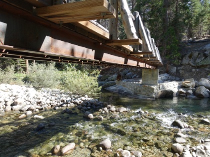 Bridge over the Kings River in Upper Paradise Valley. There's an established backpacking site here, and we've already done our 10 miles for the day, but we decide to press on a bit further since it's still early and we're feeling good. The other side of this bridge is one of the few places on the entire loop where the trail can be hard to find, but we're soon back on track and on our way.
