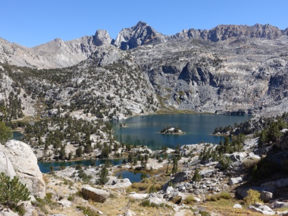 Climbing above Rae Lakes on our way to Sixty Lake Basin. The pattern of lakes is almost surreal, seems like something out of a movie or video game. If you look really close, you can see our tent!