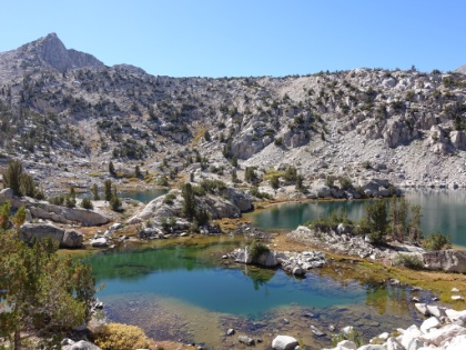 Over the divide and now dropping into Sixty Lake Basin. Another valley of beautiful interconnected lakes with amazingly clear, turquoise water.