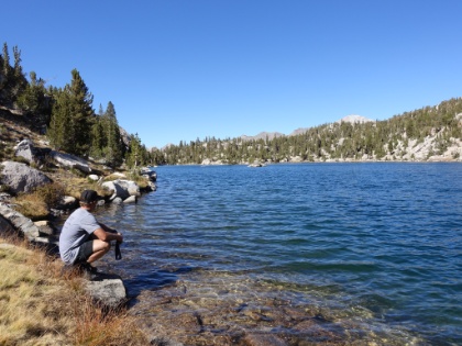Hanging out on the lake with noone around. There were little floats on the lake, which we learned later from a Ranger are part of an ongoing restoration program to kill off non-native fish.