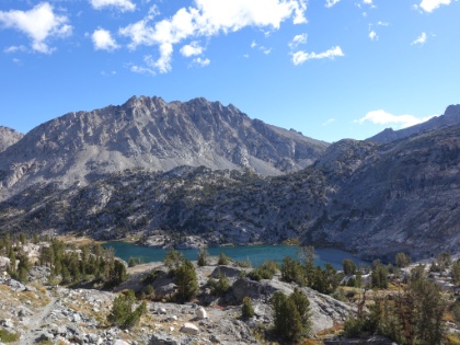 Looking down at the upper Rae Lake. We're gaining elevation quick and the wind is howling.