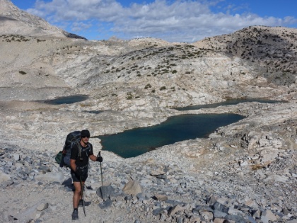 Looking down at the lakes in the basin below. One of the craziest elevation defying pictures I've ever taken. It looks like Dustin is standing next to a little pond. That lake is actually about 700' below us!