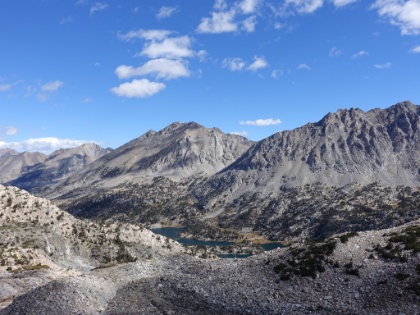 Rae Lakes far below with the clouds blowing across the ridge. The highest peaks are Black Mtn and Diamond Peak, both over 13,000'.