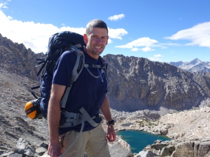 Dustin's picture of me on the pass, fully bracing myself in the wind, pack straps flapping and hair on end.