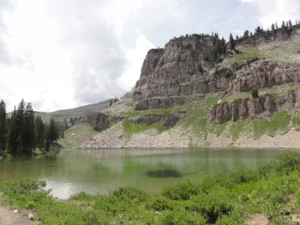 I eat a quick lunch, filter enough water from the lake to last the rest of the day, and then head out. Here looking back at the lake.