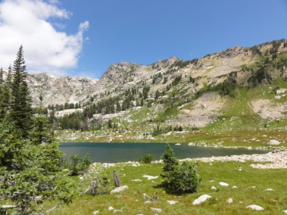 The other end of Lake Solitude. The lake is unfortunatlely a popular day hike destination, so there is not quite as much solitude as its name implies. The only good part about having day hikers around is that I get asked questions like "You're out here for 4 days?", "By yourself!?", "Do you have someone you check in with every night?". That's always good for morale :)