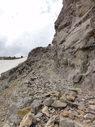 Steep downhill on loose rock with a heavy pack. A proprioceptive torture test.