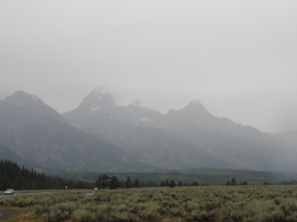 Back on the main road at one of the many turnouts with picturesque views of the Tetons. It has been raining for most of the day, which doesn't bode well for weather conditions for the hike.