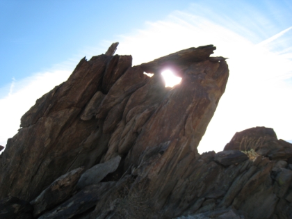 Morning sun through the rocks. There are some amazing rock formations up here.