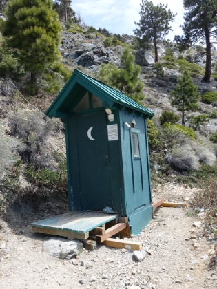 Looks like a new (or renovated) outhouse near the hut.