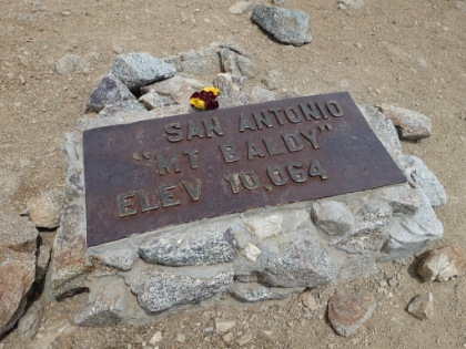 Made it. Someone had just put down a flower memorial for Sam. I talked to her for quite a while swapping Sam stories. I'm glad I had a chance to meet him a few times and to read his numerous sign-ins on top of Iron Mountain and at my favorite secret trail near Topanga. I stayed on top for almost 45 minutes. Time to get down fast now!