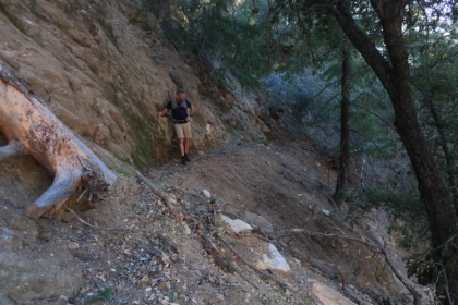Dad's photo of me checking out one of the awesome, dicey sections of trail.