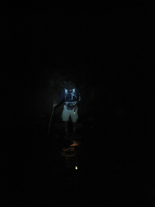 Dad crossing Fish Creek in the dark, illuminated by only my headlamp and his small flashlight.