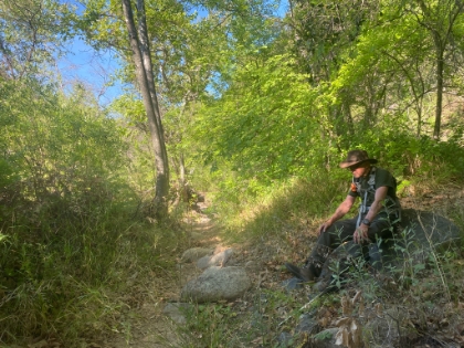 Dad takes a little break at Fisherman's Camp before heading up the switchbacks on this very warm day.