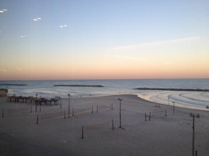 View from the hotel lobby. Volleyball courts on the Mediterrean. Too bad no one was playing!