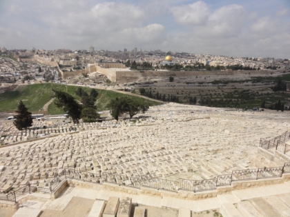 A look across the Kidron Valley at the Mount of Olives (Mt. Olivet) Cemetary.  Jews have been buried here for over 3,000 years, and there are currently over 150,000 tombs. Jewish prophecy states that when the Messiah comes, the resurrection of the dead will begin here.