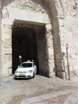 We enter the Old City via Zion gate in the Southwest corner. It's very surreal to see a car driving out of this gate that dates back thousands of years. But there are about 30,000 people living here, so they have to get around somehow.