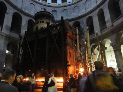 The Edicule in the center of the rotunda. It is a chapel within which is contained the Holy Sepulchre itself, the tomb where Jesus was buried.