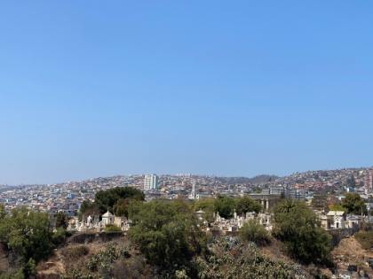 A look out at the cemetary and dense buildings on the hills beyond.