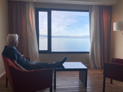 Dad checking out the view from our room in Hotel Xelena on the shore of Lago Argentino.