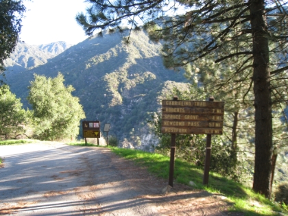 Getting started. Unfortunately the trail starts with a half mile of downhill paved road (which makes for a painful uphill at the end of the day).
