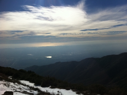 An ocean view with Catalina and San Clemente islands in the distance and snow in the foreground. Pretty cool. At this point, it's 3:15pm and I have about 2 1/2 hours until it gets pretty dark. With no headlamp, I'm going to have to make good time coming down. I know I won't be making normal 2:1 time on this trail.