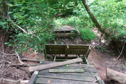 As you get further out around the loop, the trail gets more overgrown and less maintained. Here a bridge is out, and it's a good thing the creek isn't flowing too high.