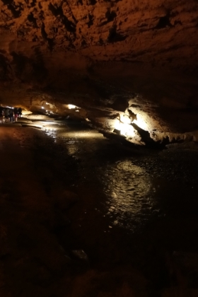 Moving on in the tour, we walk along the underground stream. It's a good size stream.