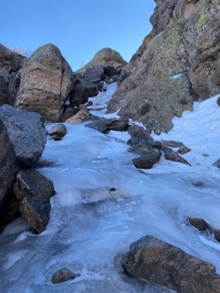 Not a chance. I was dismayed to see that there was at least another 100' of wet glass. Pictures just don't do it justice. This section is REALLY steep. I sat for quite a while debating about if, or how, to attack this. It was probably the closest I've ever come to giving-up and calling it a day. And of course I knew getting down would be even harder. Finally I decided to try to at least make it to the next rock. Then from there I just barely got to the next rock. And then to the next. And eventually I actually made it!