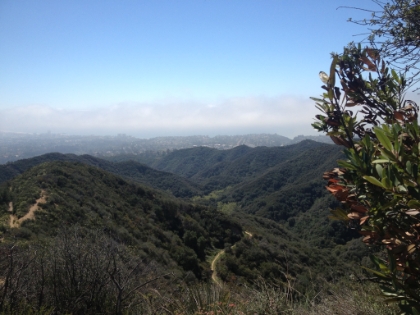 Looking down at the Backbone Trail from the single track running parrallel along the ridge above the main trail.