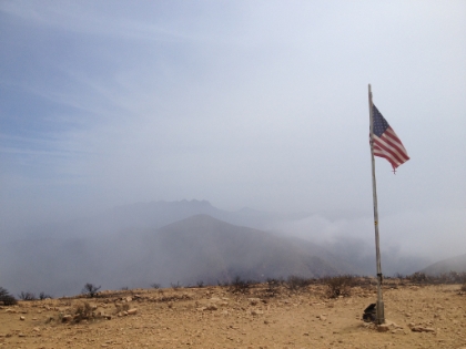 Flag and sign-in box on Mugu Peak at 1,266'.
